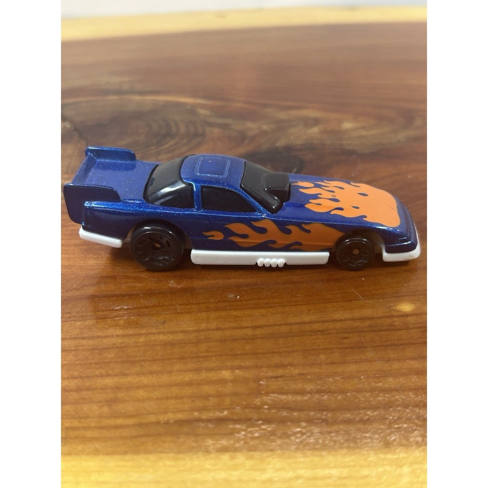 Hot Wheels 1993 MC 20 loose diecast racecar usually beat 20 cars